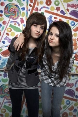  Dem and Sel in front of a Candy background