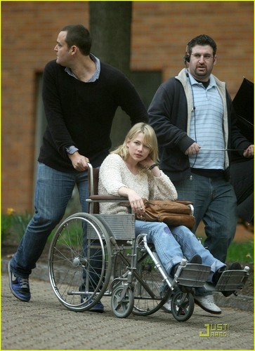 Michelle in a wheelchair on the set of her new film Blue Valentine