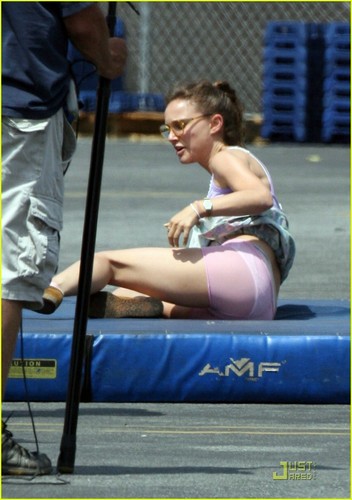  Natalie Portman wrestles one of her costars to the ground