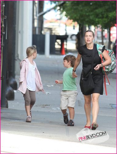  Kate Winslet walks with her kids