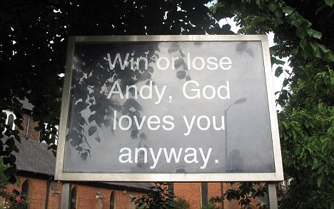  A Sign from outside a church in Wimbledon