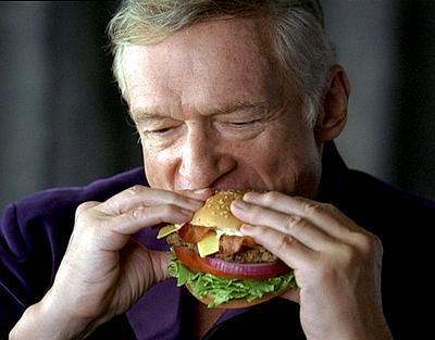  Hugh Hefner eating a Burger
