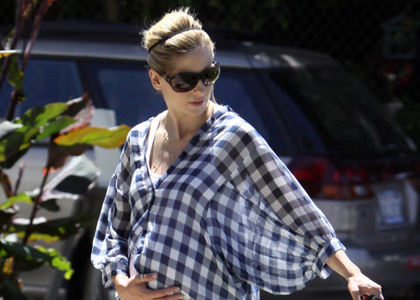  Sarah shows off her baby bump while out in LA walking her dog