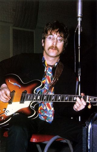  John Lennon and his Epiphone Casino