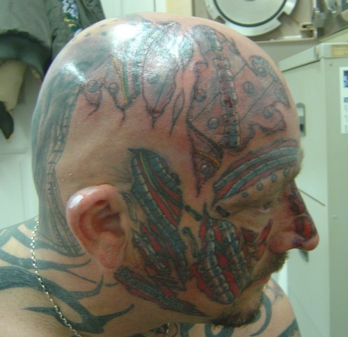  Head and face bio mechanic tattoo