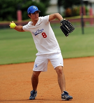 Playing softball. 