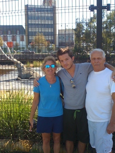  simon curtis with his mom and dad