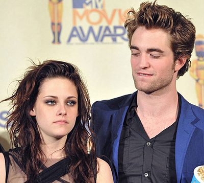  Rob & Kris...What do Du think he's thinking...?
