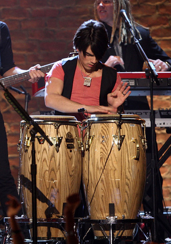  Joe Jonas on conga drums